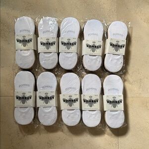 10 packs of 4 each. 40 pairs total